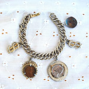 SALE!! 1960 real coins charm bracelet, dollar sign charms 1953 penny 1956 nickel, in great condition! Heavy textured chain 7.5&quot; x 1/2&quot; w