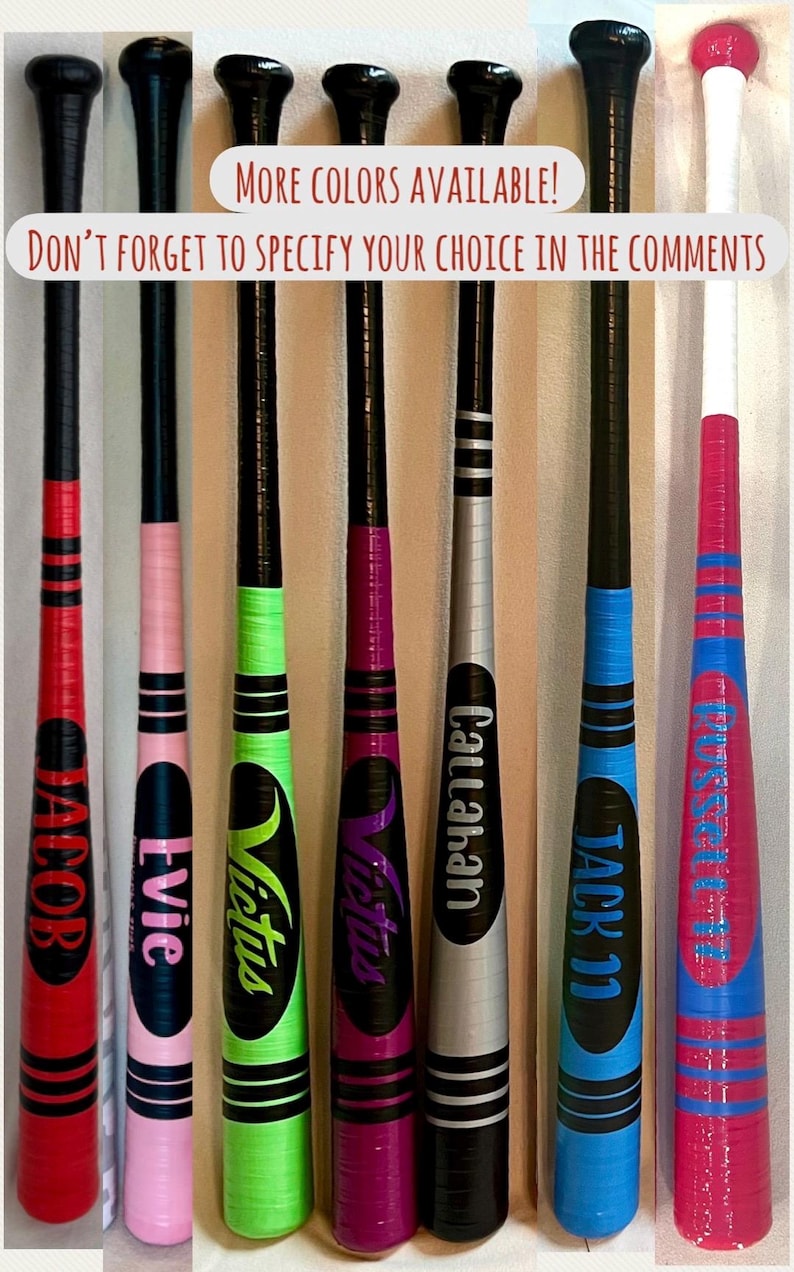 May include: A collection of personalized baseball bats in various colors, including red, pink, green, purple, silver, blue, and pink. Each bat features a name or team logo, with the text "MORE COLORS AVAILABLE!" and "DON'T FORGET TO SPECIFY YOUR CHOICE IN THE COMMENTS".