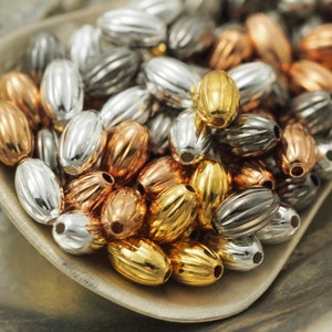 50 Corrugated Oval Beads - 5mm X 3mm in Silver Plate, Gold Plate, Copper Plate and Gunmetal - 100% Guarantee