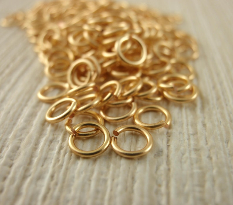 100 anneaux métalliques plaqués argent ou dorés qui ne ternissent pas calibre 20 pièce d'identité au choix fabriqués à la main pour vos créations image 2