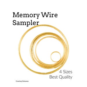 May include: A gold-colored memory wire sampler featuring four concentric circular coils of varying diameters. The text Memory Wire Sampler, 4 Sizes, Best Quality, and Creating Unkamen is printed in black around the metallic wire loops.