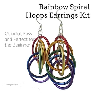 May include: Rainbow colored metal hoops earrings kit. The earrings are made of multiple hoops that are interlocked and spiral. The hoops are in the colors of the rainbow, red, orange, yellow, green, blue, indigo, and violet.
