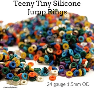 May include: A large pile of colorful silicone jump rings in various sizes. The rings are 24 gauge and 1.5mm in diameter.