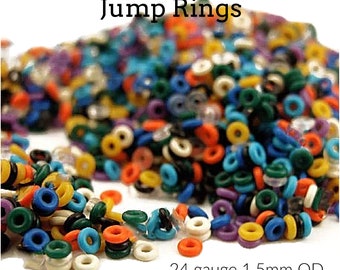May include: A large pile of colorful silicone jump rings in various sizes. The rings are 24 gauge and 1.5mm in diameter.