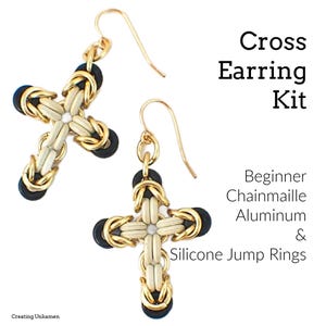 May include: A pair of gold cross earrings made with aluminum chainmaille and silicone jump rings. The earrings are a beginner project.
