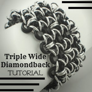 May include: A triple wide Diamondback bracelet made of black and silver metal rings. The bracelet is displayed on a white surface. The text "Triple Wide Diamondback TUTORIAL" is visible in the image.