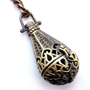 Aromatherapy Locket - I Dream of Jeannie in Antique Brass 41mm X 21mm - 14mm Bead Cage