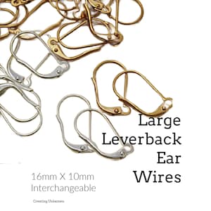Könnte beinhalten: Eine Sammlung von gold- und silberfarbenen Ohrhaken mit Klappmechanismus aus Metall. Der Text auf dem Bild lautet Large Leverback Ear Wires, 16mm X 10mm Interchangeable und Creating Unkamen. Diese Schmuckkomponenten haben einen Klappverschluss.