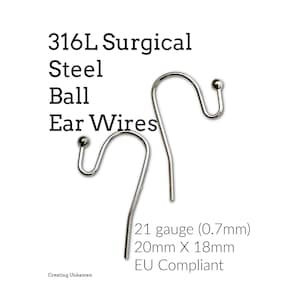 May include: Two silver-colored 316L surgical steel ball ear wires with a hook shape. The text reads 316L Surgical Steel Ball Ear Wires, 21 gauge (0.7mm), 20mm X 18mm, EU Compliant, and Creating Unkamen. These jewelry components feature a small ball.