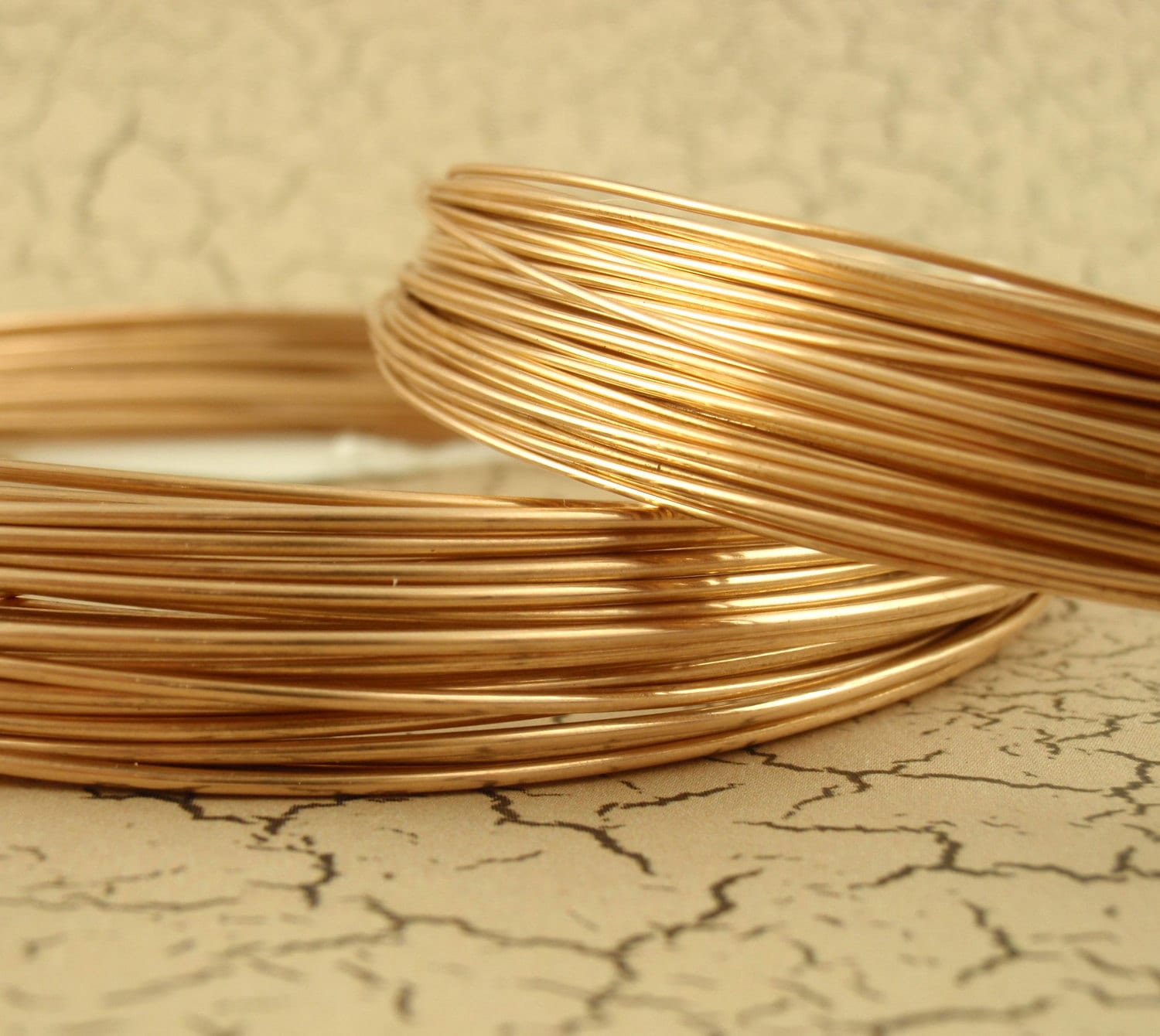 Wire, ParaWire™, brass, jeweler's bronze, round, 22 gauge. Sold