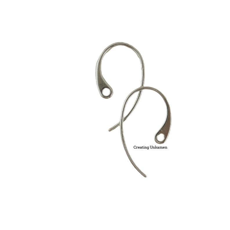 May include: Two silver earring hooks, also known as French hooks, are shown against a white background. The hooks are made of metal and have a smooth, polished finish.