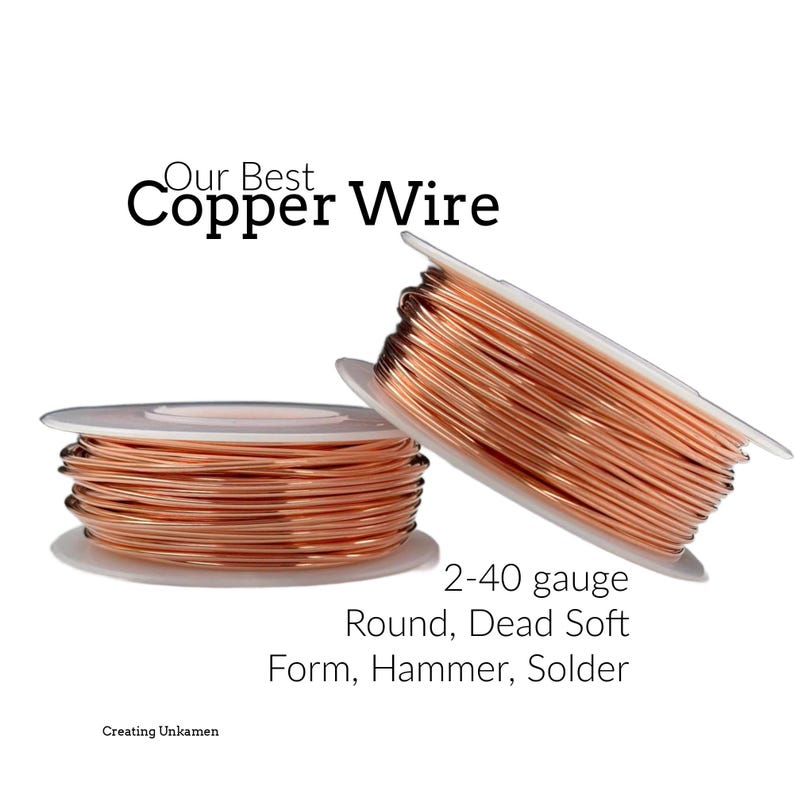 May include: Two spools of shiny, metallic copper wire wound around white plastic bobbins. The text reads: Our Best Copper Wire, 2-40 gauge, Round, Dead Soft, Form, Hammer, Solder, and Creating Unkamen. The wire has a smooth, reflective surface.