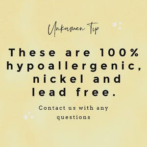 May include: A pale yellow informational graphic with black text that reads: Unkamen Tip. These are 100% hypoallergenic, nickel and lead free. Contact us with any questions. The text is accented by small white star icons on a soft, textured background.
