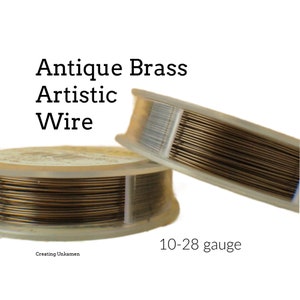 May include: Two spools of antique brass artistic wire, 10-28 gauge. The wire is wound around a clear plastic spool with a white label.