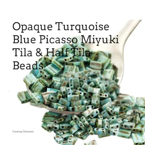 May include: A close-up of a spoon filled with turquoise blue and green opaque Picasso Miyuki Tila and Half Tila beads. The beads are small and rectangular with a slightly irregular shape.