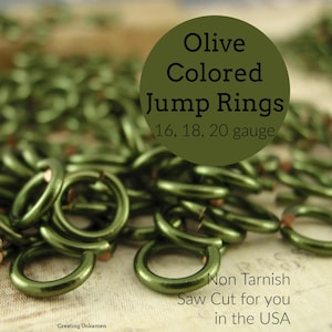 May include: A collection of olive-colored jump rings in 16, 18, and 20 gauge. The rings feature a non-tarnish finish and are saw cut. The text on the image reads Olive Colored Jump Rings 16, 18, 20 gauge, Non Tarnish Saw Cut for you in the USA.