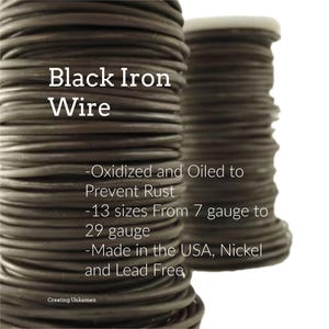 May include: Two spools of black iron wire wrapped in a continuous coil. Text on the image reads: Black Iron Wire, Oxidized and Oiled to Prevent Rust, 13 sizes From 7 gauge to 29 gauge, Made in the USA, Nickel and Lead Free, Creating Unkamen.