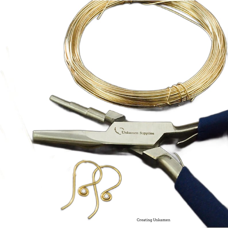 May include: A coil of gold-coloured wire, a pair of gold-coloured earring hooks, and a pair of silver-coloured pliers with blue handles. The pliers are labelled "Unkamen Supplies".