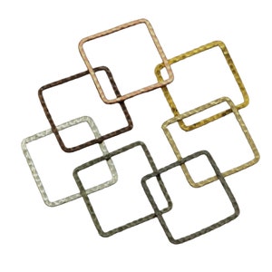 May include: A set of six interlocking square rings in different metallic finishes, including silver, gold, copper, and bronze. The rings are connected to each other, creating a geometric pattern.