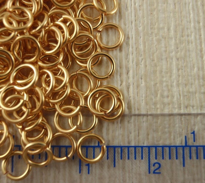 100 anneaux métalliques plaqués argent ou dorés qui ne ternissent pas calibre 20 pièce d'identité au choix fabriqués à la main pour vos créations image 4