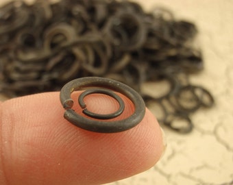100 anillos de salto de hierro negro oxidados y aceitados: usted elige el calibre y el diámetro