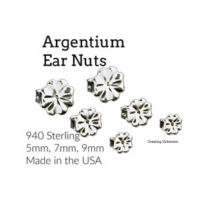 May include: Six silver ear nuts in different sizes, 5mm, 7mm, and 9mm, made of 940 Sterling silver. The ear nuts are made in the USA. The text "Creating Unkamen" is visible in the bottom right corner of the image.