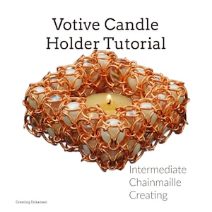 May include: A copper chainmail votive candle holder with white beads. The candle holder is square shaped and has a small candle in the center. The text "Intermediate Chainmail Creating" is below the candle holder.
