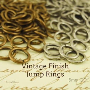 May include: Vintage finish jump rings in gold and silver tones. The rings are 5mm in diameter.