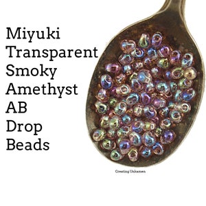 Miyuki DP-256 Transparent Smoky Amethyst AB Drop Beads
