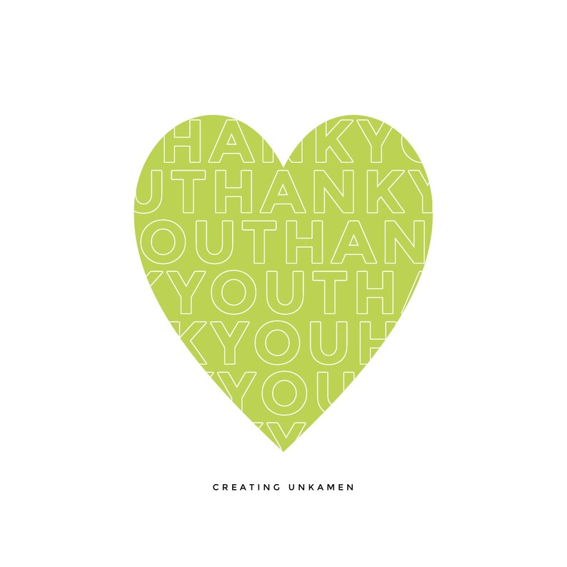 May include: A lime green heart shape featuring the repeated white text THANK YOU arranged in a grid pattern. Below the heart, the text CREATING UNKAMEN is printed in a small, black, sans-serif font against a plain white background.