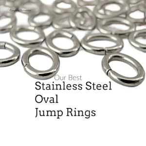 May include: A close-up of a pile of silver oval jump rings. The rings are made of stainless steel and are perfect for jewelry making.