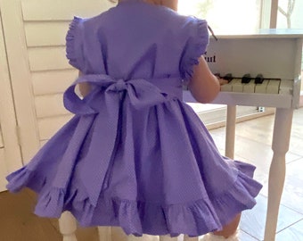 purple school pinafore