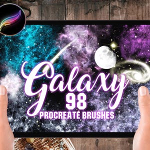 May include: A digital tablet displaying a galaxy themed image with the text "Galaxy 98 Procreate Brushes". The image features a swirling nebula with stars and a moon.