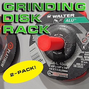 May include: Two-pack of grinding disc racks, each with a red holder and a black grinding disc. The grinding disc has the text "WALTER 20° ALU" and "08-L 450 4 1/2" x 1/4" x 7/8" 115 X 7 X 22,23mm" printed on it. The text "2-PACK!" is printed on a yellow oval sticker.