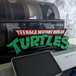 Teenage Mutant Ninja Turtles 3D Printed Plaque – A Must-Have for TMNT Fans!