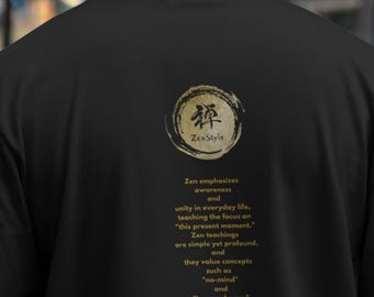 May include: Black t-shirt featuring a gold circular design with the text "ZenStyle" and a description of Zen teachings. The shirt promotes awareness and unity in daily life.