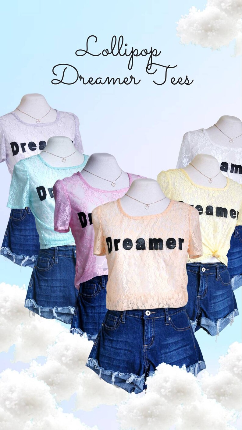 May include: Five lace tops with the text "Dreamer" in black lettering. The tops are in various pastel colors, including light blue, pink, yellow, and peach. Each top is paired with denim shorts.