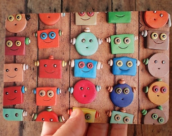 Happy Robot Faces in Rows Art Postcard