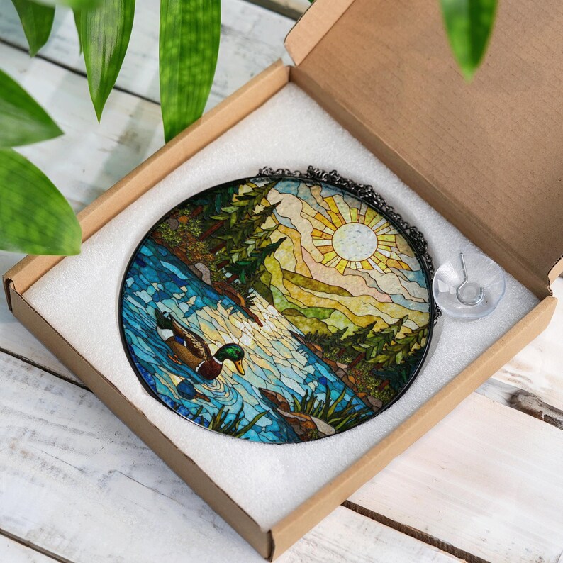 a box with a picture of a lake inside of it