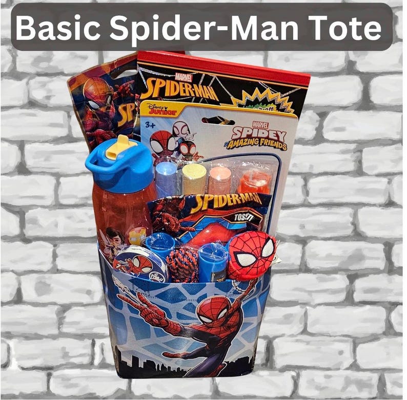 May include: A Spider-Man themed tote bag filled with toys and accessories. The tote features a blue and white design with Spider-Man graphics. Contents include a water bottle, Spidey Amazing Friends toys, and other Spider-Man themed items. The text "Basic Spider-Man Tote" is at the top.