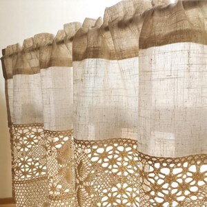 Victorian white cotton cafe curtain with ruffled valance and shabby chic lace trim, hung on a rustic window for French Country kitchens