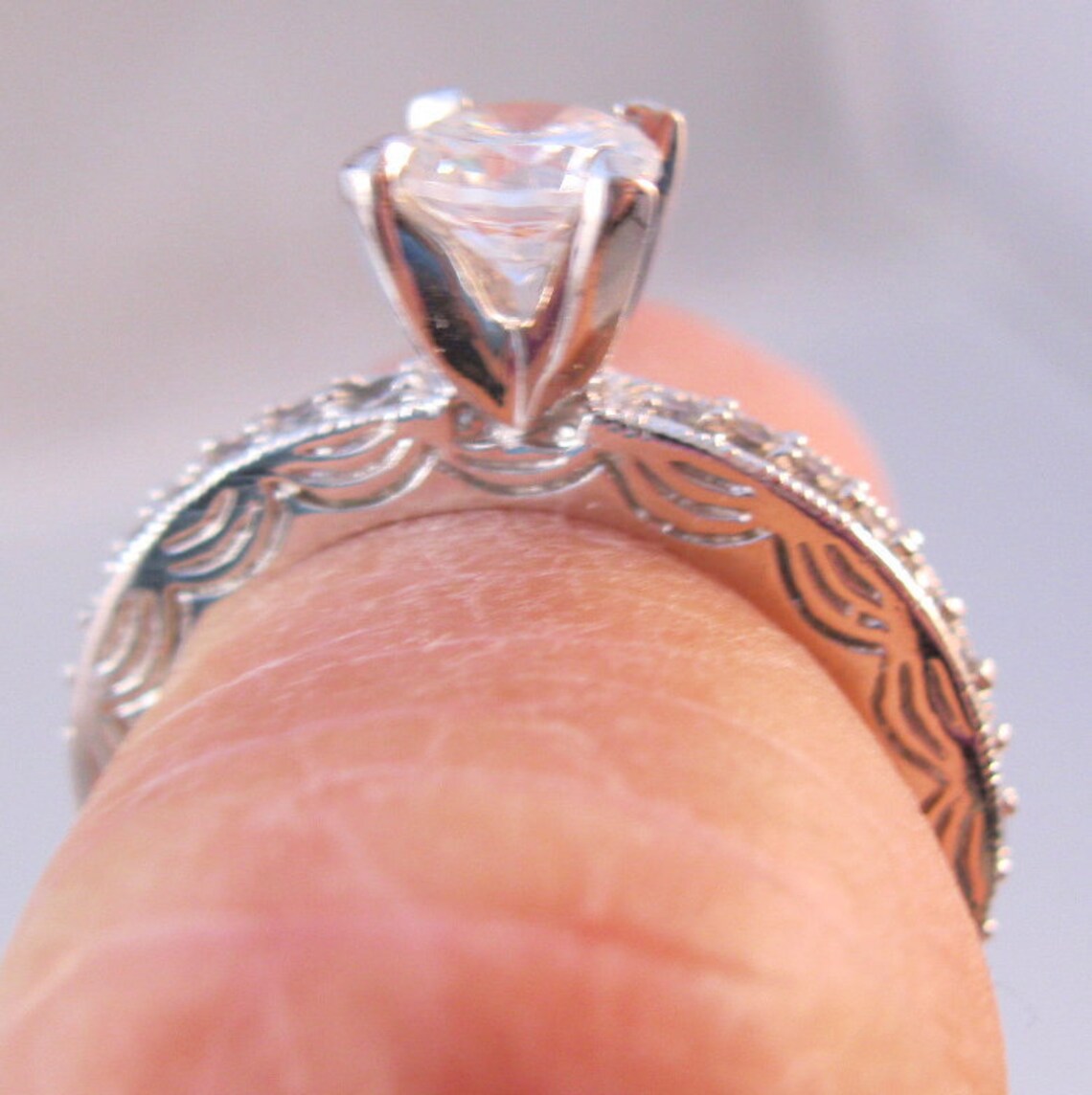 Rhodium Plated Solitaire Rectangle CZ Ring with Halo CZ Edge main image 0
