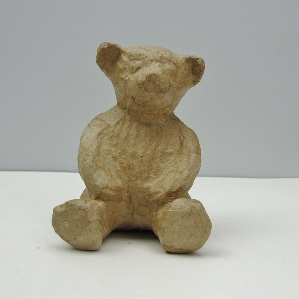 Small paper mache teddy bear