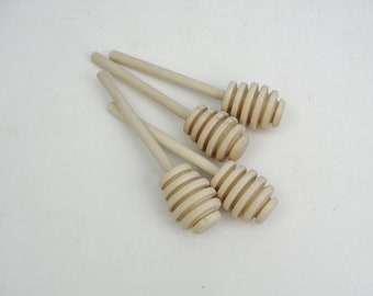 Juego de 4 cucharones para miel de 4"