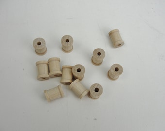 Little wooden spools 1/2" x 3/8" set of 12, wood spools