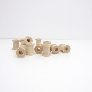 Miniature wooden spools 5/8 inch set of 12, wood spools