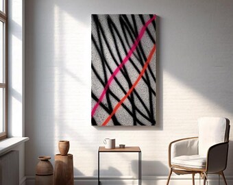 Peut inclure: Tableau d'art abstrait avec un fond gris texturé, superposé de lignes diagonales noires, roses et orange. L'œuvre est exposée sur un mur blanc, ajoutant une touche moderne au décor de la pièce. Il s'agit d'une impression sur toile.