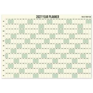 May include: A 2027 year planner wall calendar featuring a grid layout with months listed vertically from January to December. The design includes alternating cream and light green columns for days, with the text 2027 YEAR PLANNER and THIS IS YOUR YEAR.