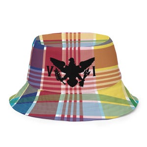 May include: A bucket hat with a colorful plaid pattern. The hat features a black silhouette of an eagle with the letters "VI" on either side of the eagle.