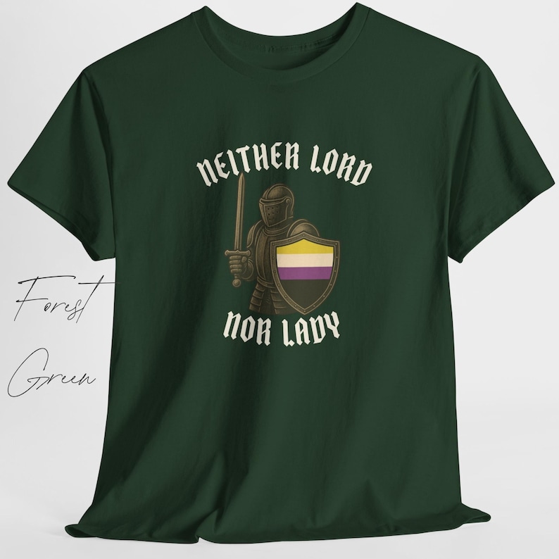 May include: Forest green t-shirt with the text "Neither Lord Nor Lady" in white gothic font. The graphic features a knight holding a sword and shield with the non-binary pride flag colors. The shirt is made of a soft material.